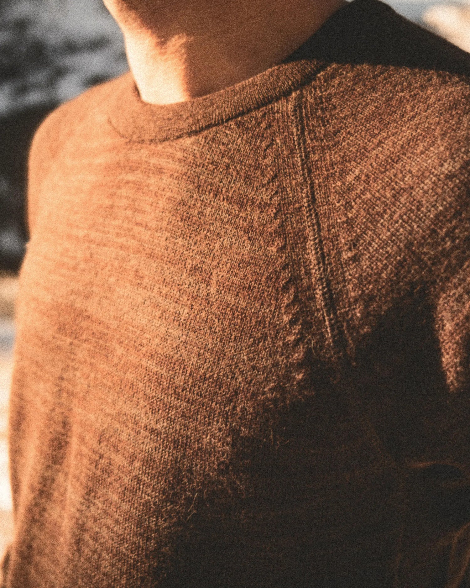 Close-Up of Sun-drenched Chest of The Original Crew Alpaca Crewneck Sweater in Cacao Dark Brown – PAKA Apparel