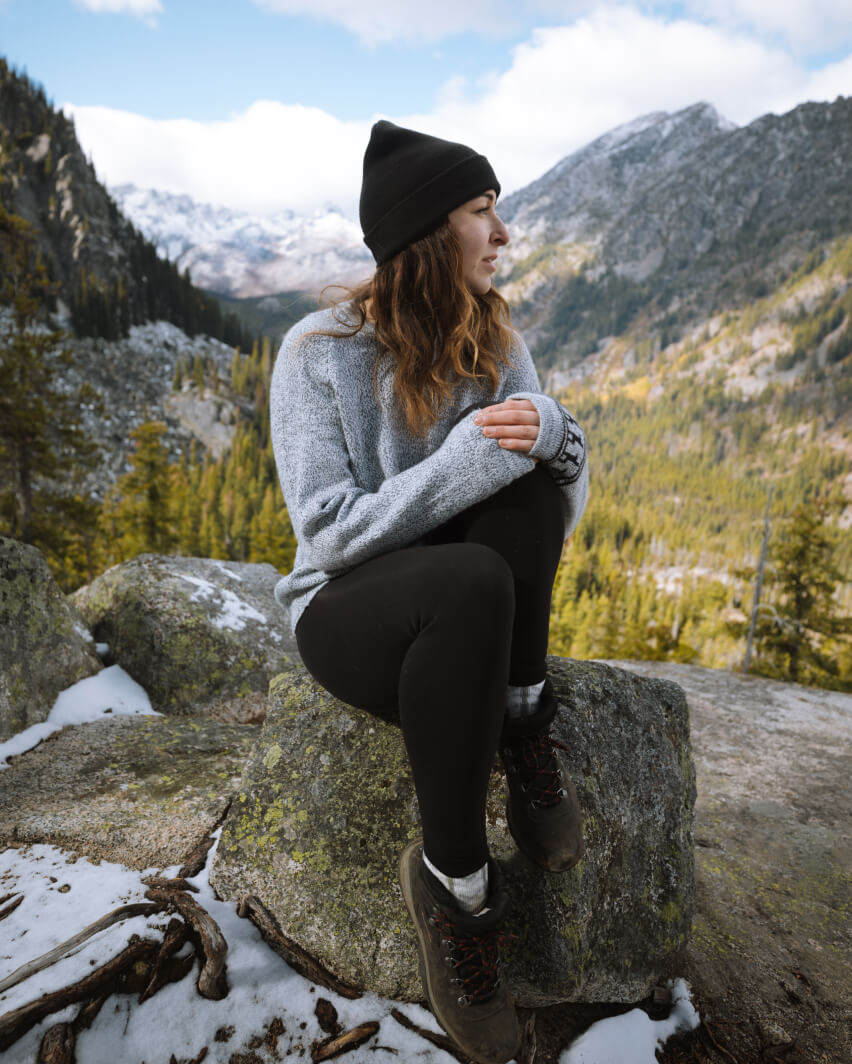A girl wearing The Costa in the mountains