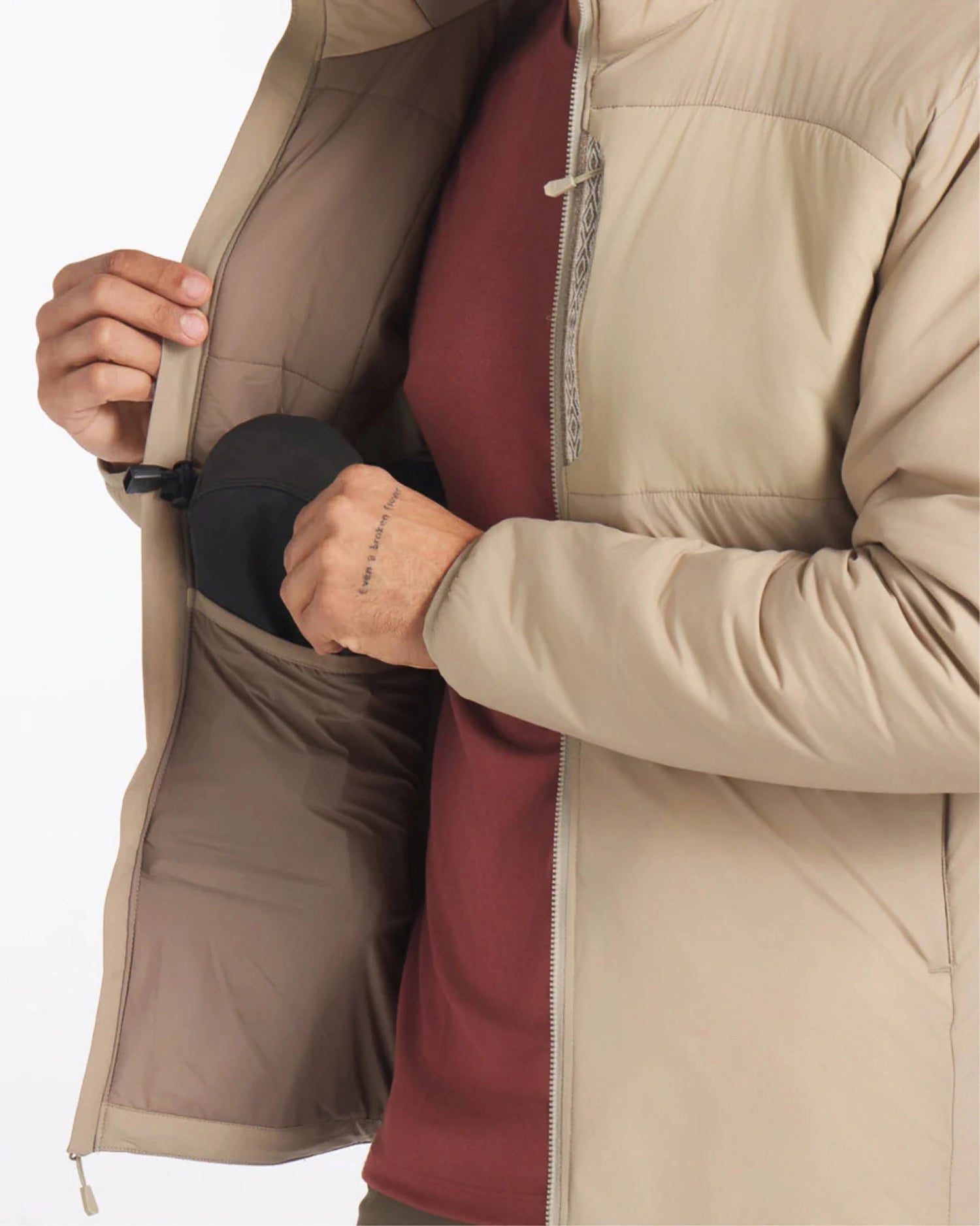 Close-Up of Interior Side Compartment of Sahara Tan Apu Lightweight Puffer Jacket – PAKA Apparel