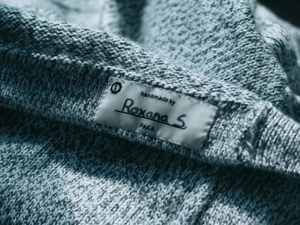 A Costa sweater with the signature of the woman who made it:  Roxana S