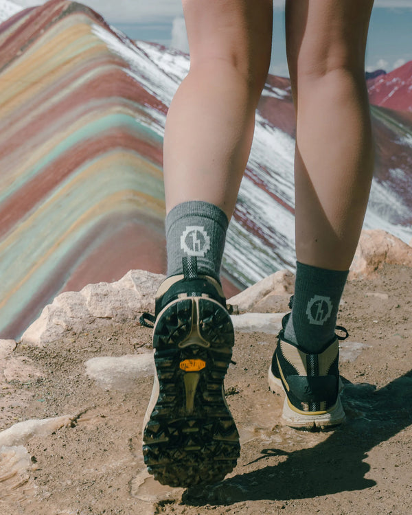 Woman wearing crew socks from back