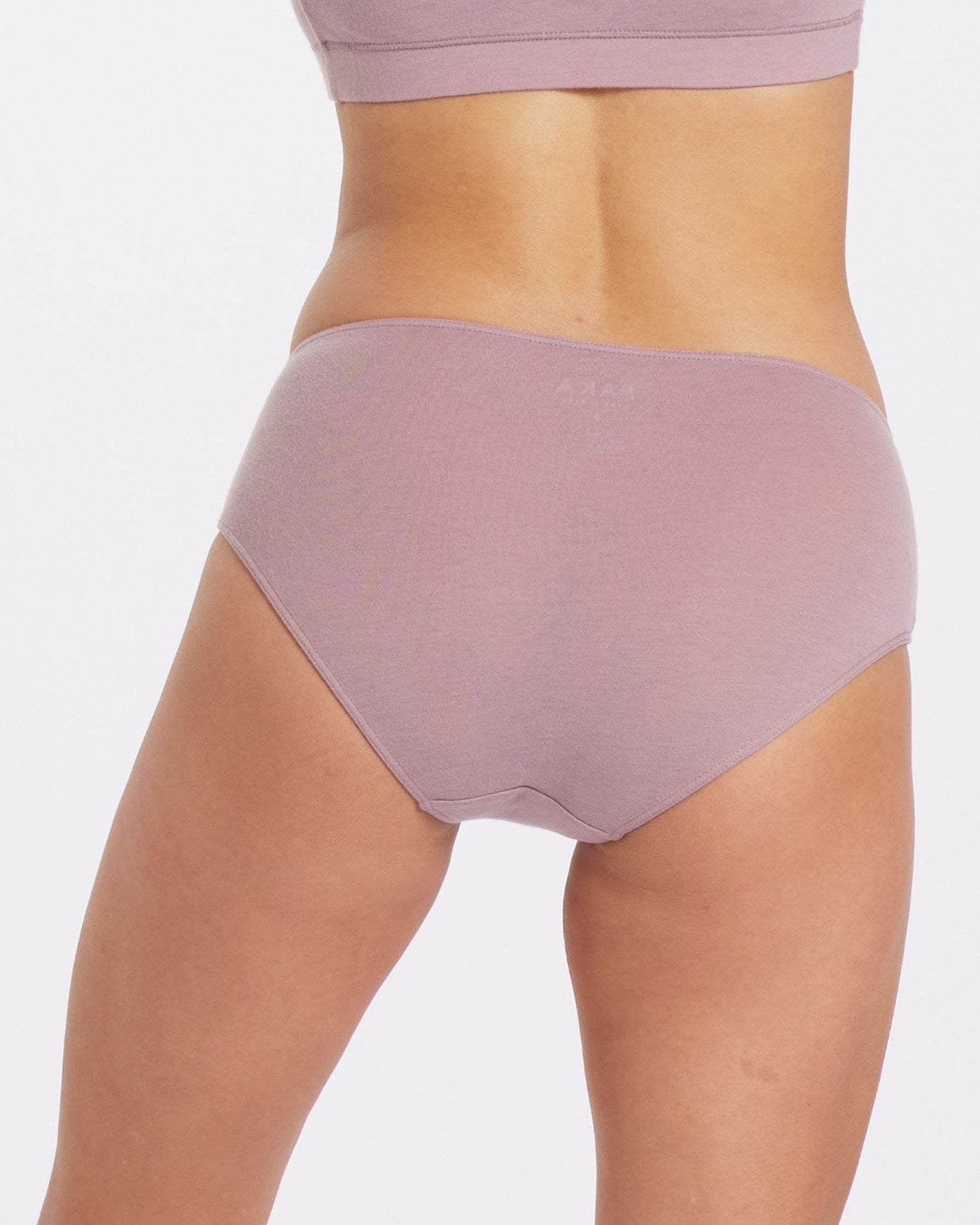 pink women's alpaca underwear on model 