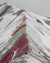 Rainbow mountain covered with snow