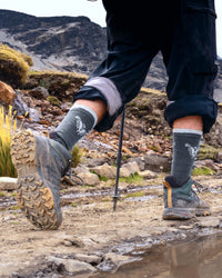 Man wearing condor socks hiking