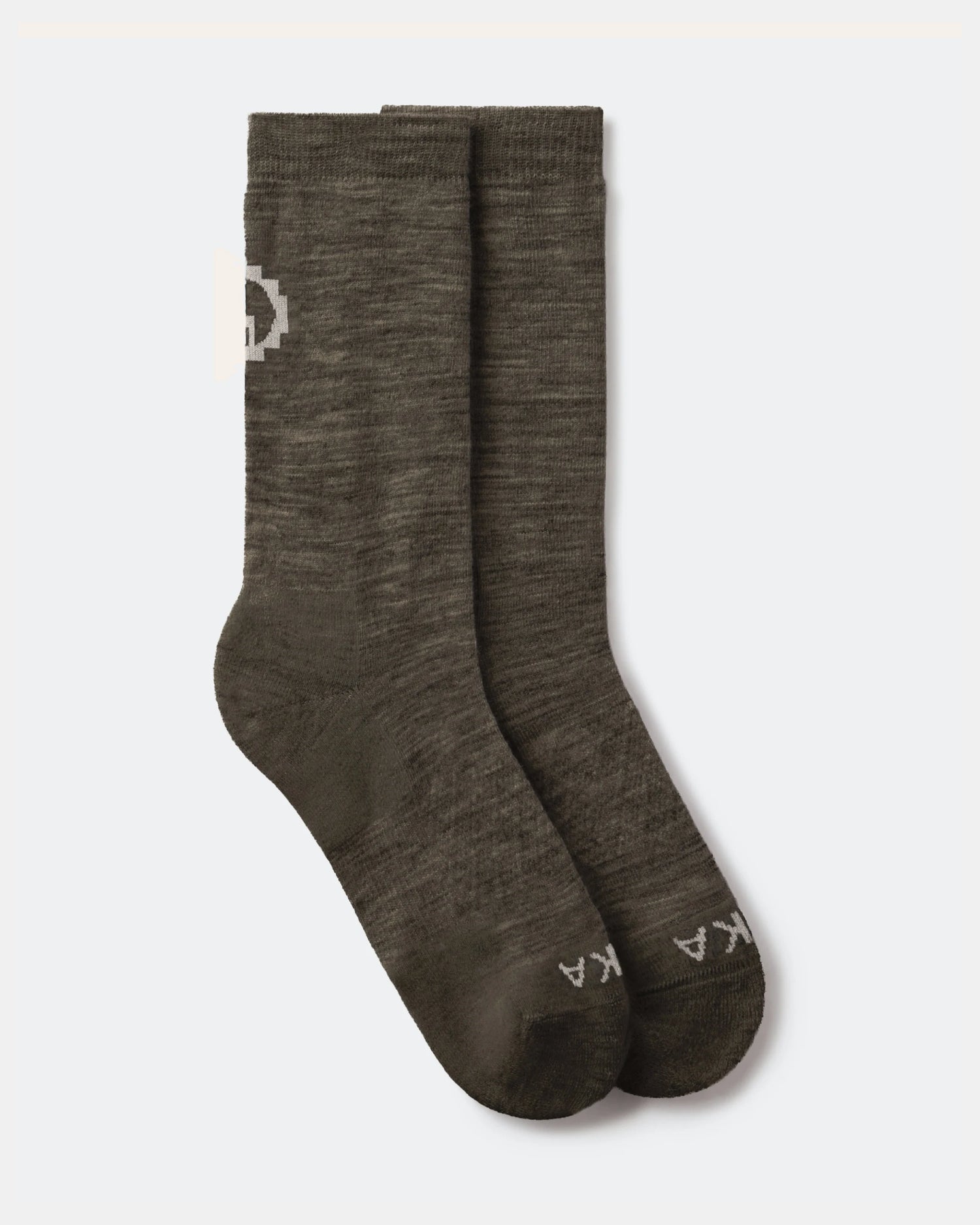 Pair of Andean Moss socks with a logo on a white background