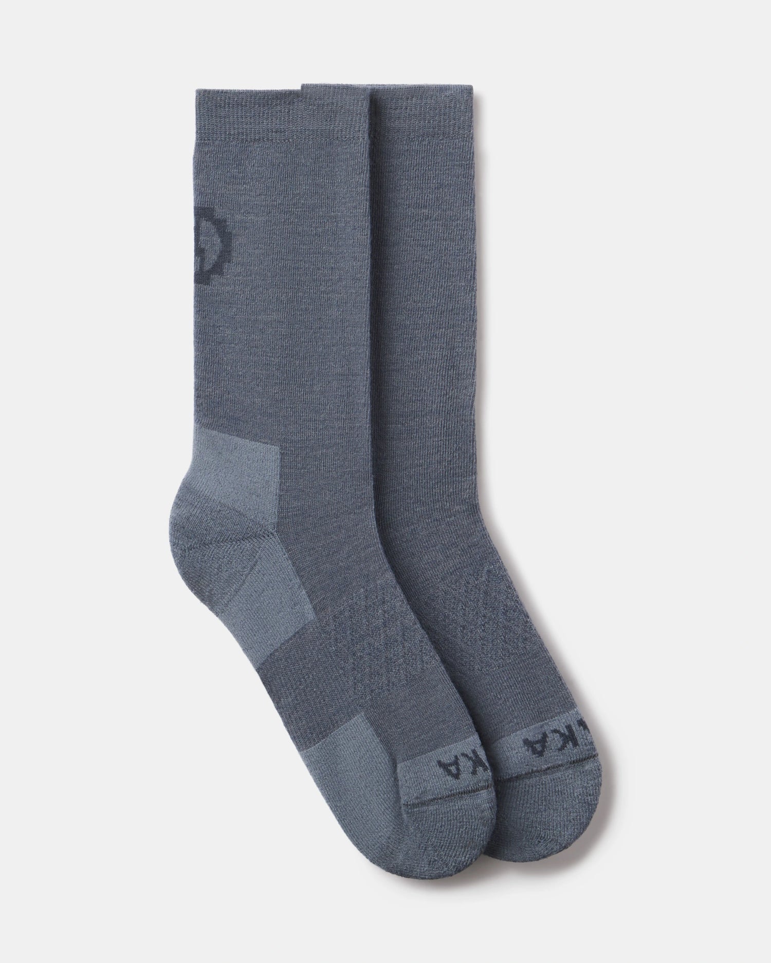 Pair of Indigo socks on a light gray background