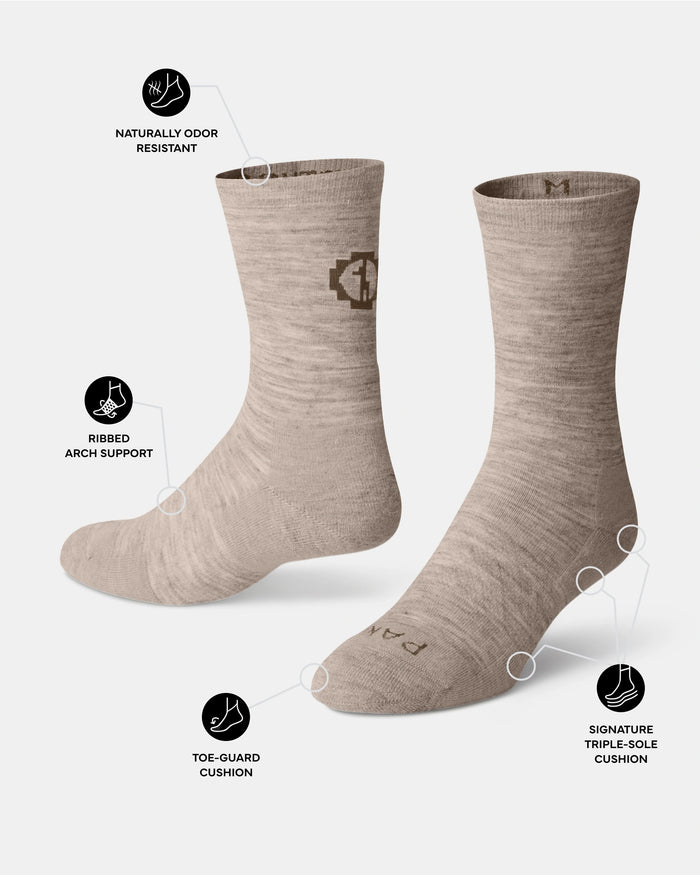 Timber socks with arch support and cushioning features on a white background