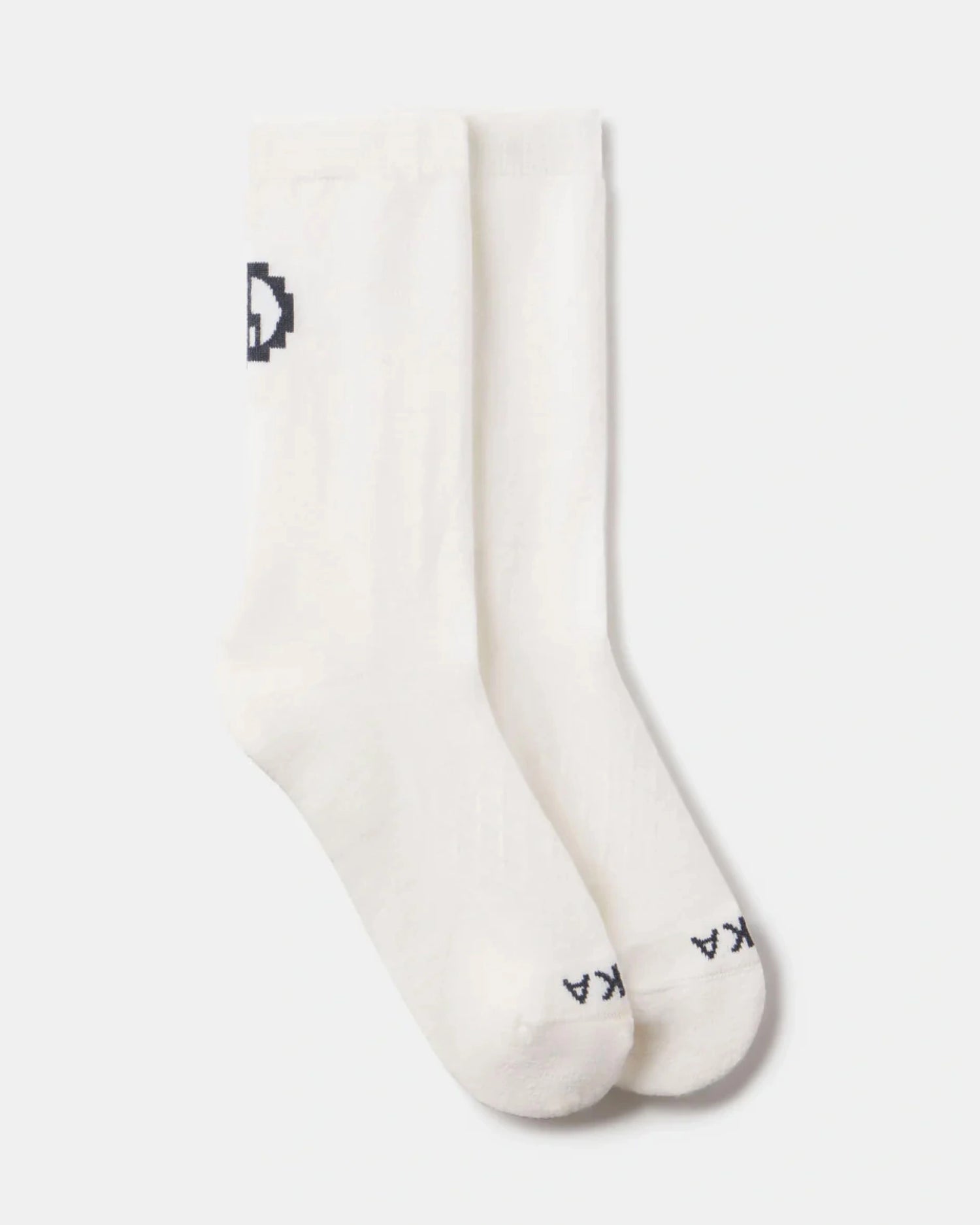 White socks with black logo on a light gray background