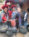 Gisella and two weavers from Cusco in the natural alpaca fiber dyeing process