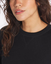 Close-up of Female Model wearing Black Ultralight Crewneck