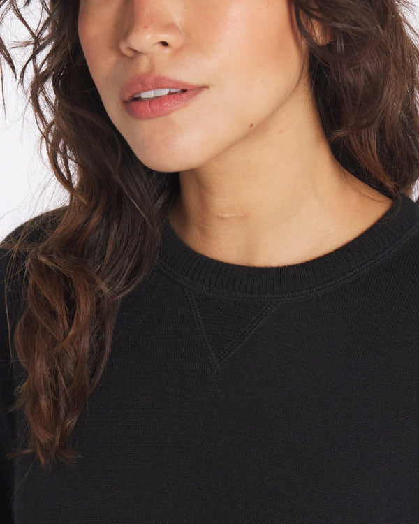 Close-up of Female Model wearing Black Ultralight Crewneck