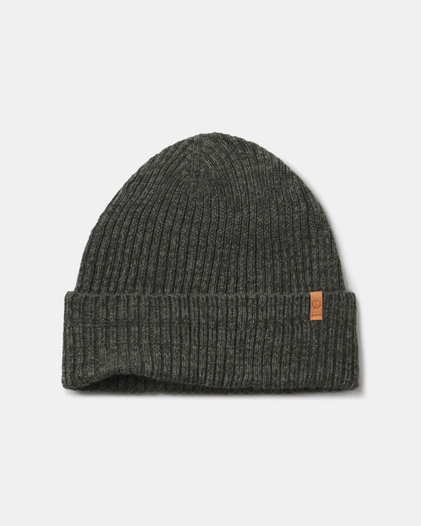 Cozy Marled Andean Moss knit beanie with PAKA brand logo on a light gray background