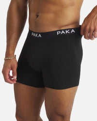 Adom is 6'2, chest 38", waist 31.5" and wearing a size M.