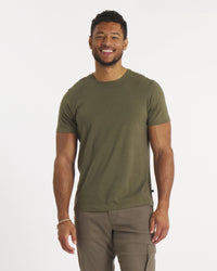 Model Wearing Essential Tee Lightweight Men's Organic Pima Cotton and Alpaca T-Shirt in Andean Moss / Dark Green – PAKA Apparel