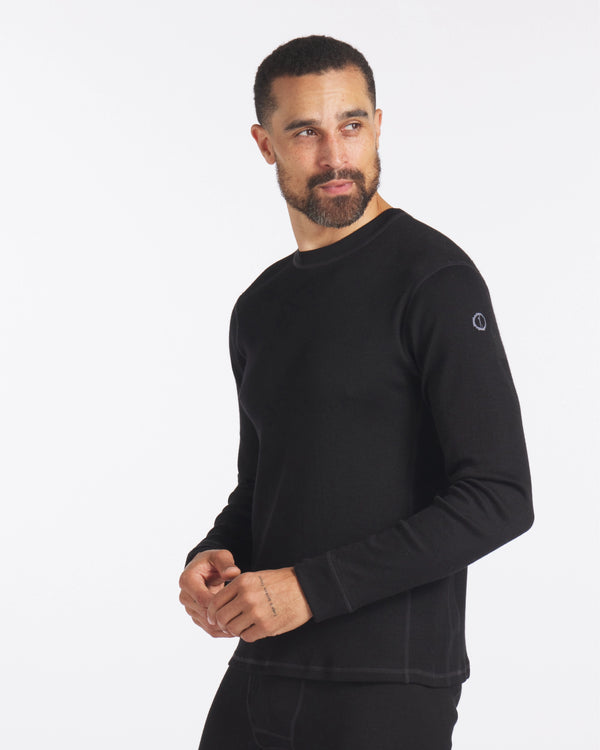 Man Looking to Side in Black Alpaca Wool Thermal Winter Baselayer Shirt – PAKA Apparel