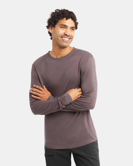 Front view of Men’s Aire Long Sleeve in Andean Truffle showcasing its slim fit with a light gray background