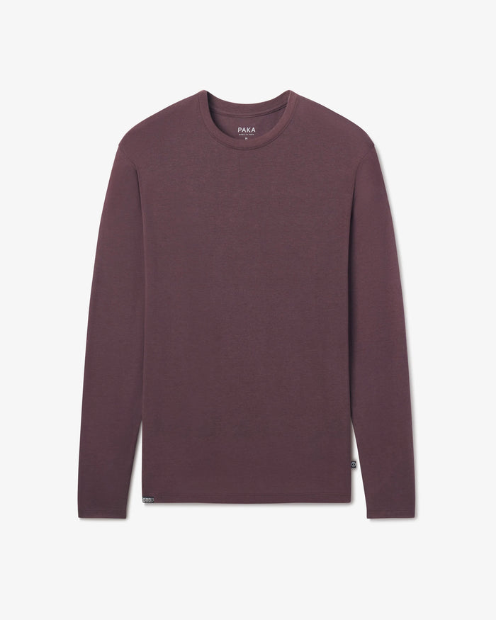 PAKA Men's Aire long-sleeve in Fig shirt on a light gray background