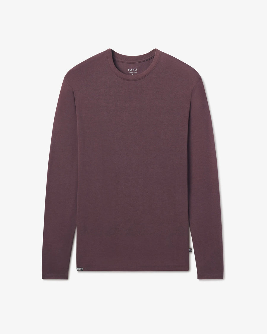 PAKA Men's Aire long-sleeve in Fig shirt on a light gray background