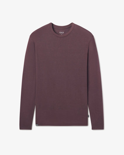 PAKA Men's Aire long-sleeve in Fig shirt on a light gray background