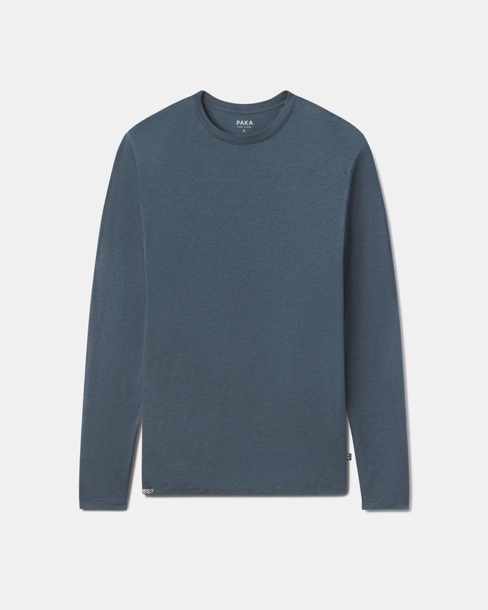 Blue long-sleeve shirt on a light gray background