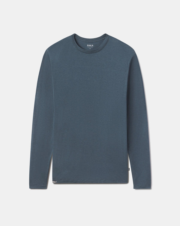 Blue long-sleeve shirt on a light gray background