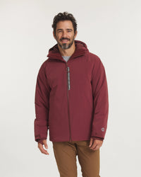 Model Wearing Men’s Apu Parka Ski Jacket in Burgundy with Hood and Front Zipper for Winter Wear – PAKA Apparel