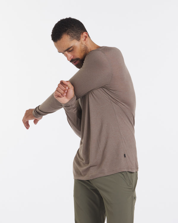 Man Stretching in Men's Aire Natural Alpaca Fiber Long Sleeve Shirt in Walnut / Brown – PAKA Apparel