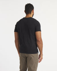 Back of Model Wearing Black Essential Tee Lightweight and Sustainable Men's T-Shirt – PAKA Apparel