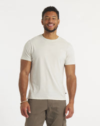 Model Wearing Essential Tee Men's Sustainable Pima Cotton and Alpaca T-Shirt in Bone / Off-White – PAKA Apparel