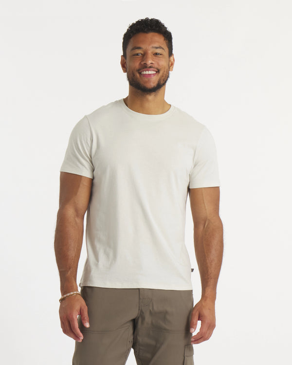 Model Wearing Essential Tee Men's Sustainable Pima Cotton and Alpaca T-Shirt in Bone / Off-White – PAKA Apparel