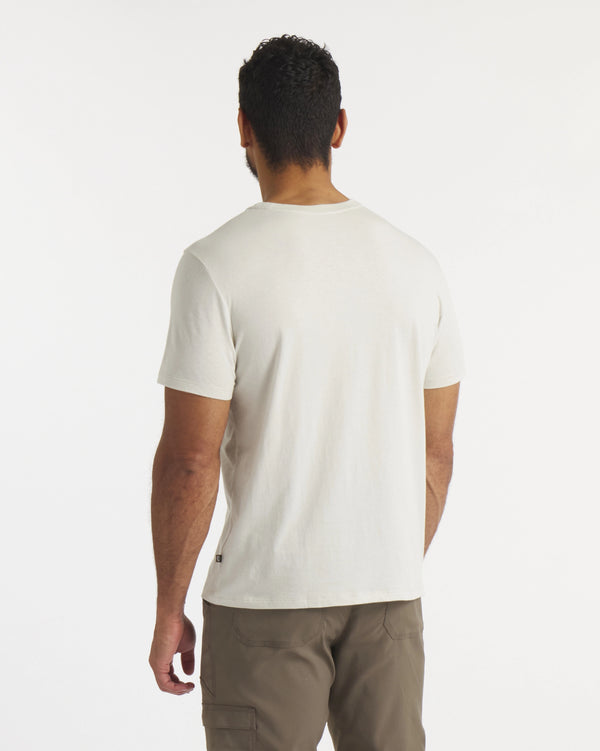 Back of Model Wearing Essential Tee Men's Sustainable Pima Cotton and Alpaca T-Shirt in Bone / Off White – PAKA Apparel
