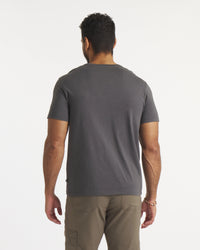 Back of Model Wearing Essential Tee Men's Sustainable Pima Cotton and Alpaca T-Shirt in Charcoal – PAKA Apparel