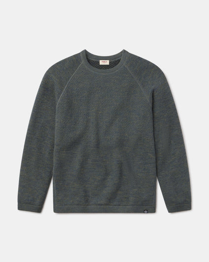 Men's PAKA Mountain Crew sweater in Forest color on a light gray background