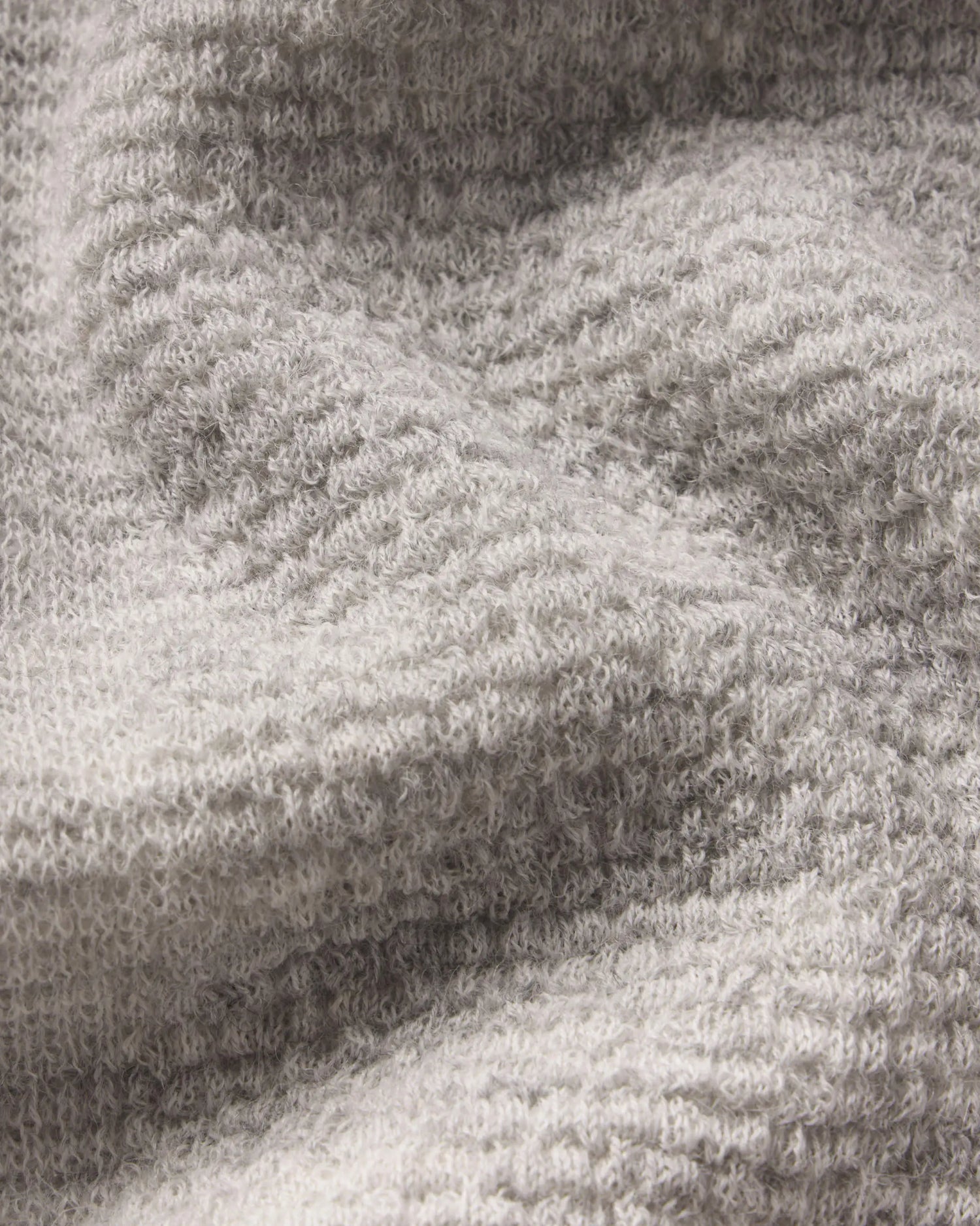 Close-up of a textured  Light Grey fabric surface