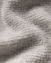 Close-up of a textured  Light Grey fabric surface