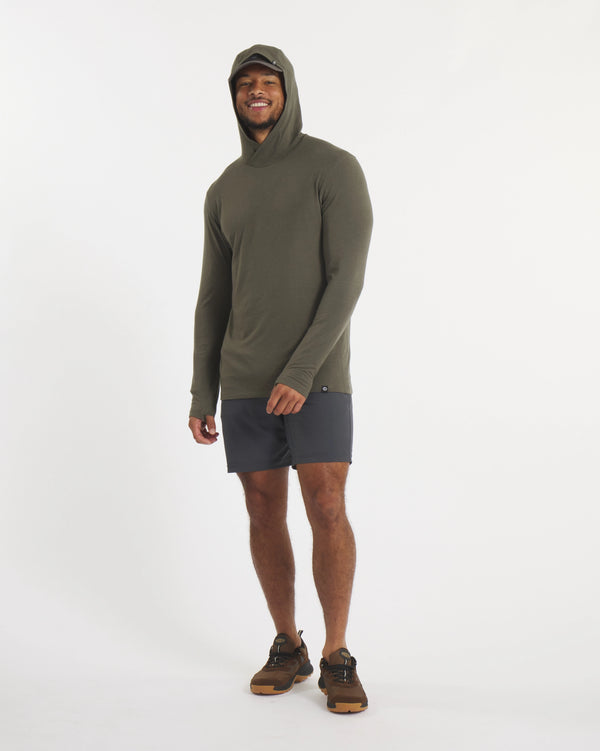 Full Height Shot of Model in Sol Men's UV Protection Hoodie in Andean Moss / Dark Green – PAKA Apparel