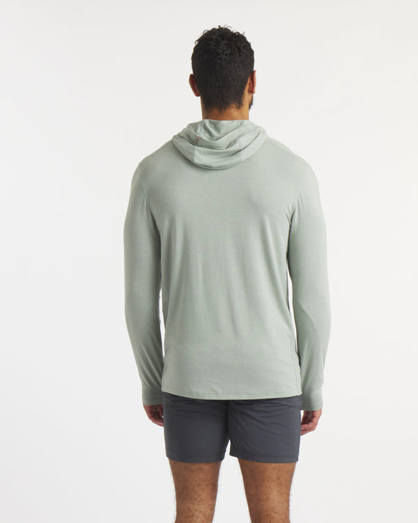 Back of Model Wearing Sol Men's Sun Hoodie in Lichen / Light Green – PAKA Apparel
