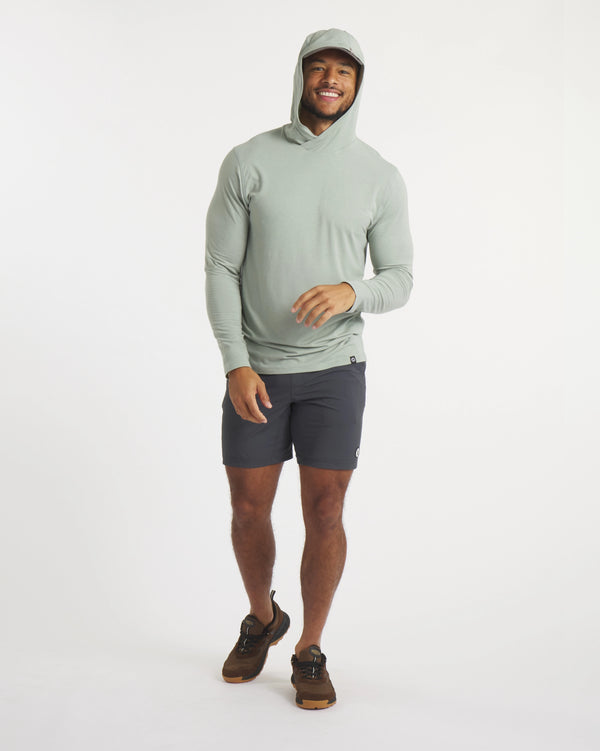 Full Height Shot of Man Wearing Sol Ultralight Sun Hoodie in Lichen / Light Green – PAKA Apparel