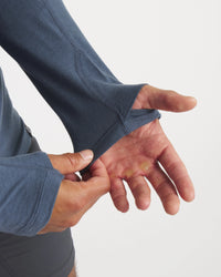 Hands Through Thumbholes of Sol Navy Men's Alpaca Sun Protection Hoodie – PAKA Apparel