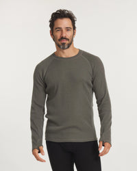 Front view of Men’s Thermal Crew alpaca baselayer in Andean Moss, slim fit with raglan sleeves and thumbholes on white