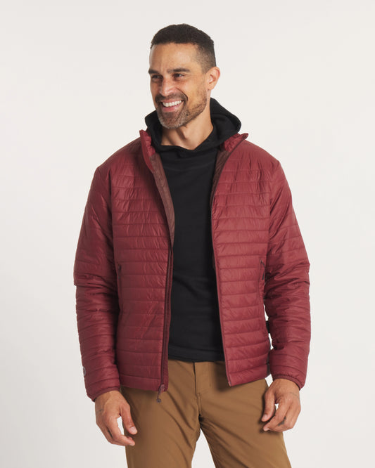 Model Smiling in Burgundy Men's Mayu Ultralight Packable Jacket – PAKA Apparel