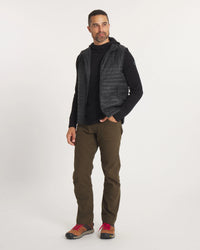 Three-quarter view of Mayu vest showing hood, quilted packable puffer with alpaca insulation on white background