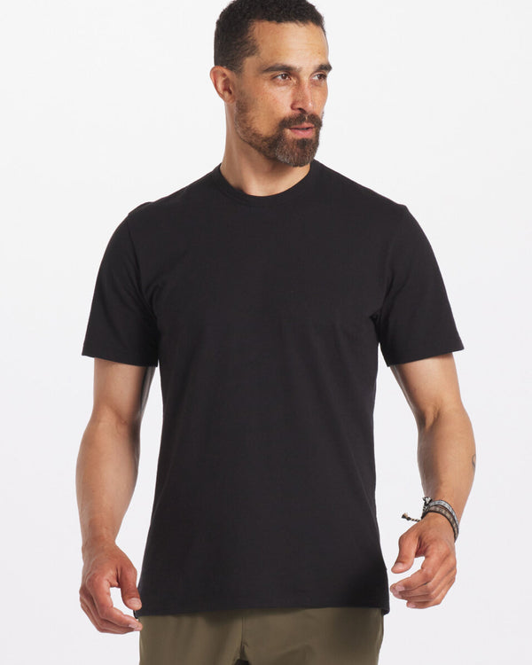 Man Wearing Sustainable Black T-Shirt in Organic Pima Cotton and Alpaca Blend – PAKA Apparel
