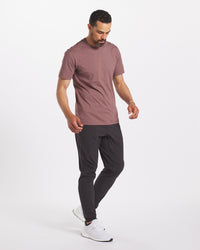 Model is 6'3" and wearing size Large. Model Looking Downward in Mauve Men's Natural Organic Pima Cotton and Alpaca T-Shirt – PAKA Apparel