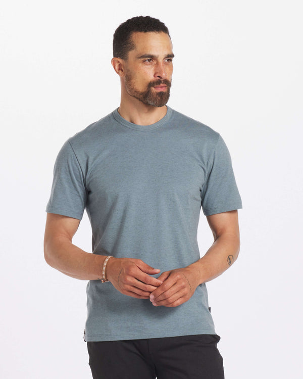 Man Looking Off Camera in Men's Organic Pima Cotton and Alpaca T-Shirt in Steel / Light Blue – PAKA Apparel