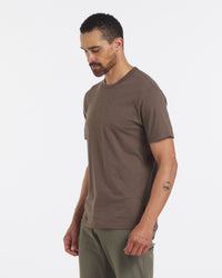 Model Looking at the Ground in Wood / Brown Organic Pima Cotton and Alpaca Blend Men's T-Shirt – PAKA Apparel