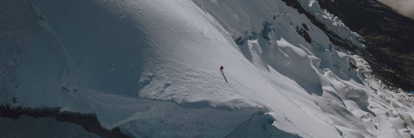 Summitting Yanapaccha snowy mountain in Peru