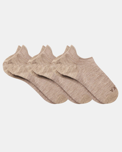 Top view of three beige Essential No Show Socks laid flat showcasing low-cut no-show design and marled knit on light gray background