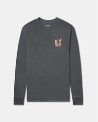 Front view of PAKA Sunset long sleeve T-shirt showcasing small left-chest sunset graphic and pigment-dyed charcoal background
