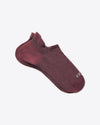 Top-down view of Trail Ankle Socks showcasing low-cut ankle height and heathered raisin color on a light background